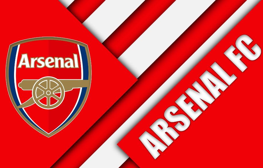 Biểu tượng Arsenal là chiếc khiên đỏ, bên trên nổi bật với dòng chữ Arsenal, bên dưới khẩu pháo thần công